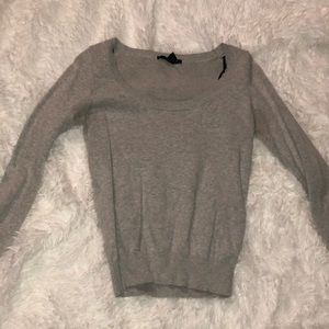 gray sweater fitted at bottom